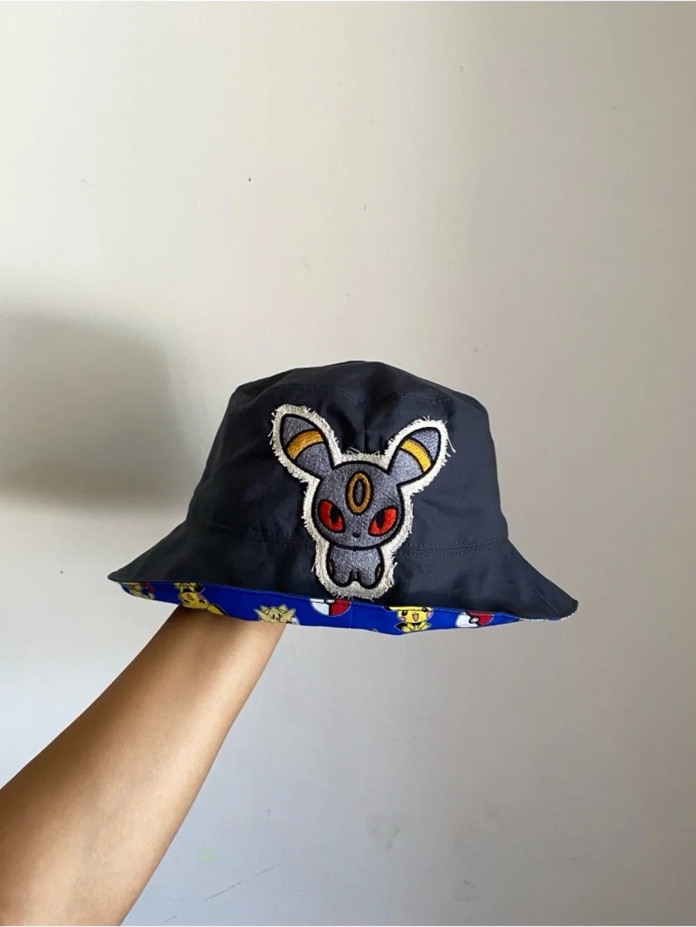 Hand Crafted Black Bucket Hat with Multi-Color Patch